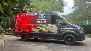 The Crosskeys Resin van on a valley road below the hillside